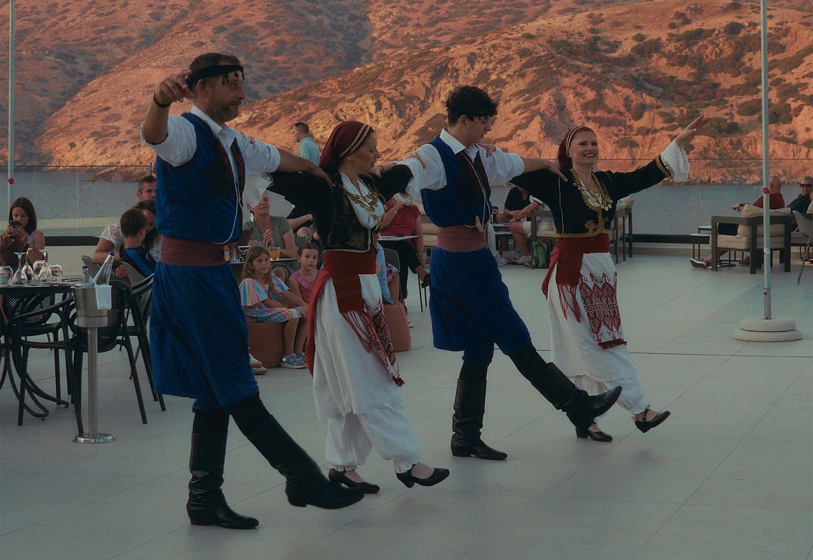 People Wearing Traditional Uniforms Doing Traditional Dancing
